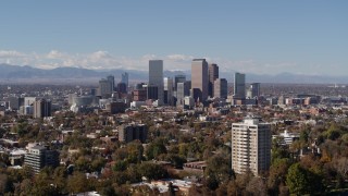 5.7K aerial stock footage of the city's skyline and mountains in the background, Downtown Denver, Colorado Aerial Stock Footage | DX0001_001720