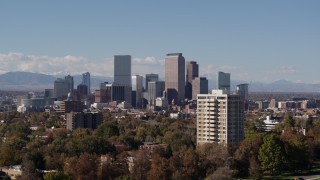 5.7K aerial stock footage pass the city's skyline before ascending, Downtown Denver, Colorado Aerial Stock Footage | DX0001_001737