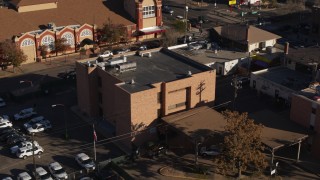 5.7K aerial stock footage of orbiting a brick police station in Denver, Colorado Aerial Stock Footage | DX0001_001768