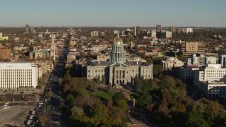 5.7K aerial stock footage flyby the Colorado State Capitol and tree-lined park, hover for stationary view in Downtown Denver, Colorado Aerial Stock Footage | DX0001_001789