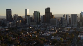 5.7K aerial stock footage slowly ascend and flyby the skyline at sunset, Downtown Denver, Colorado Aerial Stock Footage | DX0001_001812