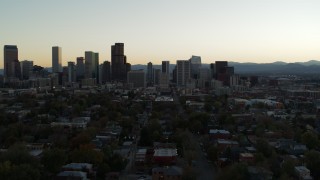 5.7K aerial stock footage approach of the city skyline at sunset during ascent, Downtown Denver, Colorado Aerial Stock Footage | DX0001_001839