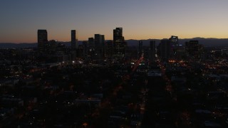 5.7K aerial stock footage fly toward the city's skyline at twilight, Downtown Denver, Colorado Aerial Stock Footage | DX0001_001881