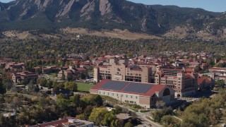 DX0001_001943 - 5.7K aerial stock footage ascend and flyby campus buildings at the University of Colorado Boulder