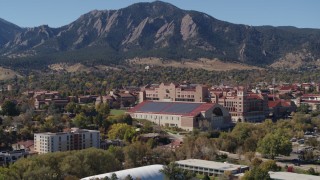 DX0001_001944 - 5.7K aerial stock footage flyby campus buildings at the University of Colorado Boulder while descending