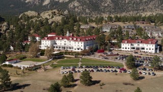 DX0001_001960 - 5.7K aerial stock footage of ascending with a view of the historic Stanley Hotel in Estes Park, Colorado