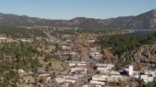 DX0001_001997 - 5.7K aerial stock footage flyby shops lining road through Estes Park, Colorado while ascending