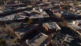 DX0001_002021 - 5.7K aerial stock footage of shops while descending near office buildings in Fort Collins, Colorado