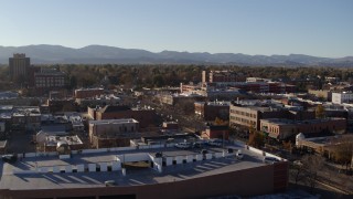 5.7K aerial stock footage reverse view and flyby a brick office buildings and shops in Fort Collins, Colorado Aerial Stock Footage | DX0001_002034