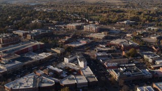 5.7K aerial stock footage of railroad tracks separating office buildings and warehouses in Fort Collins, Colorado Aerial Stock Footage | DX0001_002051