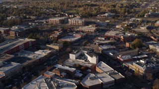 5.7K aerial stock footage orbit shops and office buildings by wide streets in Fort Collins, Colorado Aerial Stock Footage | DX0001_002054