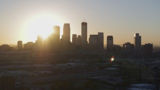 5.7K aerial stock footage a slow flyby while focusing on the city skyline at sunrise in Downtown Minneapolis, Minnesota Aerial Stock Footage | DX0001_002072