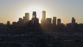 5.7K aerial stock footage of focusing on the city skyline at sunrise during slow flyby in Downtown Minneapolis, Minnesota Aerial Stock Footage | DX0001_002073