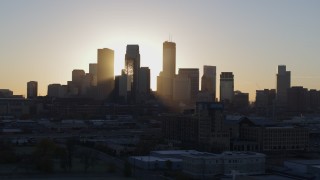 5.7K aerial stock footage focus on city skyline at sunrise in Downtown Minneapolis, Minnesota Aerial Stock Footage | DX0001_002077