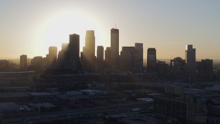 5.7K aerial stock footage descend near the city's skyline at sunrise in Downtown Minneapolis, Minnesota Aerial Stock Footage | DX0001_002083