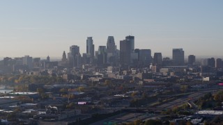 5.7K aerial stock footage slowly flying by the city's downtown skyline at sunrise in Downtown Minneapolis, Minnesota Aerial Stock Footage | DX0001_002091