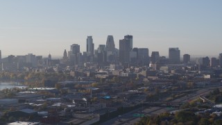 5.7K aerial stock footage slowly pass the city's downtown skyline at sunrise in Downtown Minneapolis, Minnesota Aerial Stock Footage | DX0001_002096