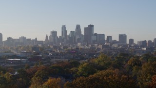 5.7K aerial stock footage descend with view of the city's downtown skyline at sunrise in Downtown Minneapolis, Minnesota Aerial Stock Footage | DX0001_002098