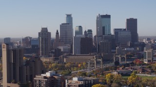 5.7K aerial stock footage of skyscrapers in city's skyline at sunrise in Downtown Minneapolis, Minnesota Aerial Stock Footage | DX0001_002103