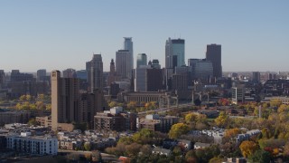 5.7K aerial stock footage the downtown skyline seen while ascending at sunrise in Downtown Minneapolis, Minnesota Aerial Stock Footage | DX0001_002128