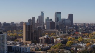 5.7K aerial stock footage the downtown skyline seen from residential buildings at sunrise in Downtown Minneapolis, Minnesota Aerial Stock Footage | DX0001_002129