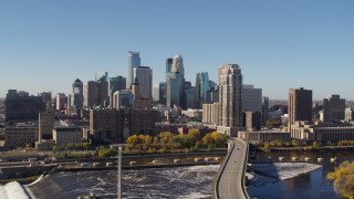 5.7K aerial stock footage a view of the skyline from the river in Downtown Minneapolis, Minnesota Aerial Stock Footage | DX0001_002133