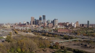 DX0001_002169 - 5.7K aerial stock footage flying by I-394 freeway and the skyline of Downtown Minneapolis, Minnesota