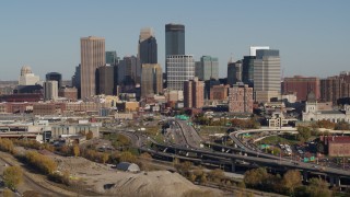 DX0001_002186 - 5.7K aerial stock footage flyby the city skyline behind the I-394 freeway, Downtown Minneapolis, Minnesota