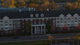 5.7K aerial stock footage of an apartment building at sunset in Minneapolis, Minnesota Aerial Stock Footage | DX0001_002210