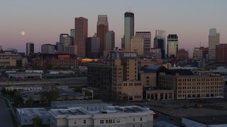 5.7K aerial stock footage the city's downtown skyline at sunset seen from marketplace, Downtown Minneapolis, Minnesota Aerial Stock Footage | DX0001_002245