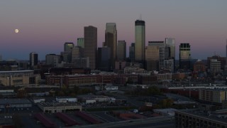 5.7K aerial stock footage ascend for view of the city's downtown skyline at twilight, Downtown Minneapolis, Minnesota Aerial Stock Footage | DX0001_002247