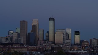 5.7K aerial stock footage a view of skyscrapers in city skyline at twilight during ascent, Downtown Minneapolis, Minnesota Aerial Stock Footage | DX0001_002268