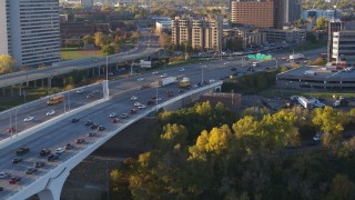 5.7K aerial stock footage of slow traffic backing up on a bridge at sunrise, Minneapolis, Minnesota Aerial Stock Footage | DX0001_002316