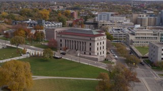 DX0001_002410 - 5.7K aerial stock footage of flying by the front of the Minnesota Judicial Center courthouse building in Saint Paul, Minnesota