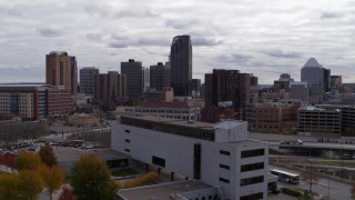 DX0001_002417 - 5.7K aerial stock footage of passing by the city's downtown skyline in Downtown Saint Paul, Minnesota and ascend