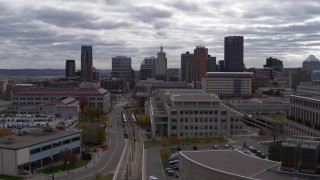 DX0001_002428 - 5.7K aerial stock footage of the city's skyline seen from a wide street, Downtown Saint Paul, Minnesota