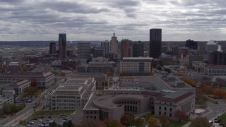 DX0001_002433 - 5.7K aerial stock footage of flying by the city skyline before descending toward street, Downtown Saint Paul, Minnesota