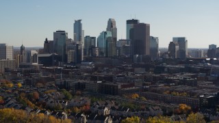 5.7K aerial stock footage focus on city skyline while flying over river, Downtown Minneapolis, Minnesota Aerial Stock Footage | DX0001_002467