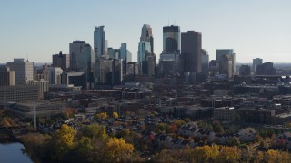 5.7K aerial stock footage focus on city skyline while approaching from river, Downtown Minneapolis, Minnesota Aerial Stock Footage | DX0001_002468