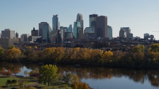 5.7K aerial stock footage focus on skyscrapers while flying away from city skyline, Downtown Minneapolis, Minnesota Aerial Stock Footage | DX0001_002470