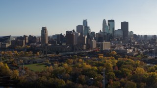 5.7K aerial stock footage fly away from the city skyline across the Mississippi River, Downtown Minneapolis, Minnesota Aerial Stock Footage | DX0001_002495