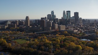 5.7K aerial stock footage flyby park with view of city skyline across the Mississippi River, Downtown Minneapolis, Minnesota Aerial Stock Footage | DX0001_002499