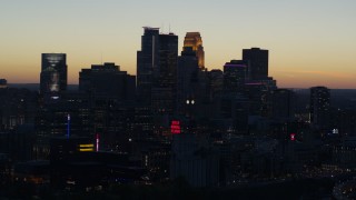 5.7K aerial stock footage of focusing on the city skyline at twilight, Downtown Minneapolis, Minnesota Aerial Stock Footage | DX0001_002569