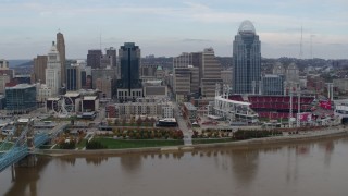 5.7K aerial stock footage fly away from city skyline and baseball stadium beside Ohio River, Downtown Cincinnati, Ohio Aerial Stock Footage | DX0001_002593