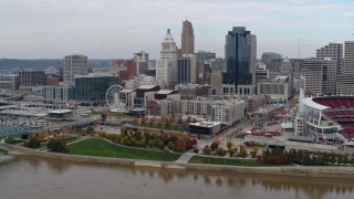 5.7K aerial stock footage reverse view of the city's skyline seen from the river, Downtown Cincinnati, Ohio Aerial Stock Footage | DX0001_002607