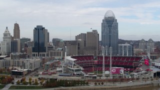 5.7K aerial stock footage reverse view of skyscraper and baseball stadium from river, Downtown Cincinnati, Ohio Aerial Stock Footage | DX0001_002613