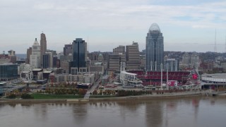 DX0001_002617 - 5.7K aerial stock footage reverse view of riverfront baseball stadium and skyline, Downtown Cincinnati, Ohio