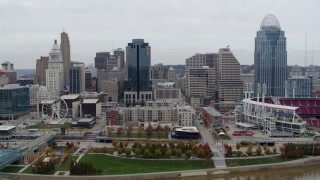 5.7K aerial stock footage flyby city's downtown skyline and baseball stadium by the Ohio River, Downtown Cincinnati, Ohio Aerial Stock Footage | DX0001_002647