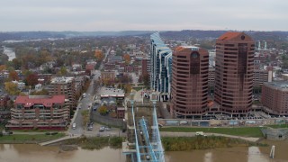 5.7K aerial stock footage reverse view of city street and condo complex, reveal office buildings in Covington, Kentucky Aerial Stock Footage | DX0001_002656