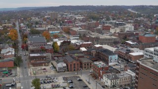 DX0001_002664 - 5.7K aerial stock footage reverse view of brick buildings in downtown in Covington, Kentucky